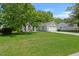 Single Gathering home with a well manicured front yard and long driveway at 102 Amberside Dr, Goose Creek, SC 29445