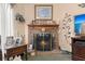 Close up of a cozy fireplace and decorated mantle at 102 Amberside Dr, Goose Creek, SC 29445