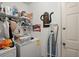 Functional laundry room with storage shelves and cleaning essentials neatly organized at 102 Amberside Dr, Goose Creek, SC 29445