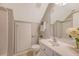 Well-lit bathroom with white cabinets, a toilet, and shower and tub combo at 102 Bristol Ln, Goose Creek, SC 29445