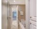Bathroom featuring a walk-in glass door shower and a luxurious soaking tub at 102 Bristol Ln, Goose Creek, SC 29445
