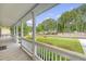 View from the porch showcasing the neighborhood and well-maintained landscaping at 102 Bristol Ln, Goose Creek, SC 29445