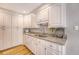 Kitchen with plenty of cabinet storage and stone countertops at 102 Bristol Ln, Goose Creek, SC 29445