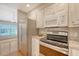 Kitchen with hardwood flooring, stainless appliances, and granite countertops at 102 Bristol Ln, Goose Creek, SC 29445