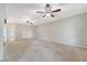 Spacious living room with neutral walls, carpet and an electric fireplace at 102 Bristol Ln, Goose Creek, SC 29445
