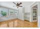 Bright office featuring built-in cabinetry, desk space, and hardwood flooring at 102 Bristol Ln, Goose Creek, SC 29445