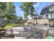 Backyard with seating, garden, and manicured lawn for entertaining at 103 Fishburne St, Charleston, SC 29403