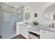 Bathroom features a large walk-in shower, and double vanity with marble counters at 103 Fishburne St, Charleston, SC 29403