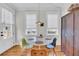 Charming dining area with a round table, natural light, and inviting decor at 103 Fishburne St, Charleston, SC 29403