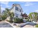 Side view of a charming two-story home with a well-manicured lawn at 103 Fishburne St, Charleston, SC 29403