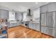 Well-equipped kitchen featuring stainless steel appliances and ample counter space at 103 Fishburne St, Charleston, SC 29403