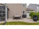 View of back patio with furniture, gas grill, and view of the home's siding at 110 Ricewood Ln, Moncks Corner, SC 29461