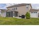 The house features a great backyard with a screened in porch and a concrete patio area at 110 Ricewood Ln, Moncks Corner, SC 29461