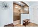 Stylish walk-in shower features tiled walls, mosaic accents, and ample natural light from a window at 110 Ricewood Ln, Moncks Corner, SC 29461