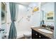 Bathroom with tile shower, granite counters, and neutral decor at 110 Ricewood Ln, Moncks Corner, SC 29461