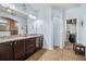 Elegant bathroom with double vanity, granite countertops, and walk-in shower showcases modern design at 110 Ricewood Ln, Moncks Corner, SC 29461