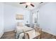 Serene bedroom with blue walls, a twin bed, and natural light from the window at 110 Ricewood Ln, Moncks Corner, SC 29461