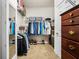 Functional walk-in closet with shelving, hanging rods, and a built-in chest offers ample storage at 110 Ricewood Ln, Moncks Corner, SC 29461