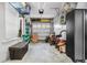 Organized garage space with storage shelves, tool chests, and room for multiple vehicles at 110 Ricewood Ln, Moncks Corner, SC 29461
