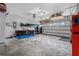 Large garage with workbench, storage cabinets, and ample space for vehicles or hobbies at 110 Ricewood Ln, Moncks Corner, SC 29461