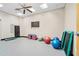 Brightly lit fitness room with exercise balls, step platforms, fitness mats and a television at 110 Ricewood Ln, Moncks Corner, SC 29461