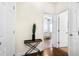 Hallway with hardwood floors and a view into another room at 110 Ricewood Ln, Moncks Corner, SC 29461