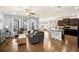 Open floor plan with an elegant living room flowing into the modern kitchen and dining areas at 110 Ricewood Ln, Moncks Corner, SC 29461