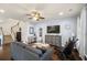 Spacious living room with a staircase and comfortable seating, perfect for entertaining at 110 Ricewood Ln, Moncks Corner, SC 29461
