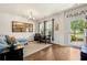 Comfortable living area featuring hardwood floors and plenty of natural light at 110 Ricewood Ln, Moncks Corner, SC 29461