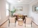 Bright home office features a wooden desk, stylish decor, and a window for natural light at 1100 Saltwater Cir, Johns Island, SC 29455