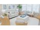Cozy living room with a neutral color palette, comfortable seating, and bright, natural light at 1100 Saltwater Cir, Johns Island, SC 29455