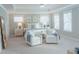 Bright main bedroom with neutral colors, a ceiling fan, and lots of natural light at 1100 Saltwater Cir, Johns Island, SC 29455