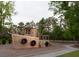 Community playground shaped like a ship, with climbing features and slide, near a walking path at 1100 Saltwater Cir, Johns Island, SC 29455