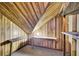 Cozy attic space featuring a wooden interior with shelves at 113 Dove Ln, Summerville, SC 29485