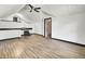 Spacious attic with a light hardwood floor, ceiling fan, and a bathroom at 113 Dove Ln, Summerville, SC 29485