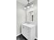 Bathroom vanity with white cabinets, drawers, countertop and modern lighting at 113 Dove Ln, Summerville, SC 29485