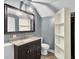Bathroom featuring modern vanity, lighting, and shelves at 113 Dove Ln, Summerville, SC 29485