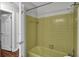 Bathroom with a green tub and shower at 113 Dove Ln, Summerville, SC 29485