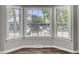 Sunlit breakfast nook with large bay windows offering a view of the backyard at 113 Dove Ln, Summerville, SC 29485