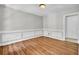Bright, empty living room with fresh paint, hardwood floors, and updated fixtures at 113 Dove Ln, Summerville, SC 29485
