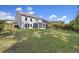 Spacious backyard with lush lawn and a screened porch, perfect for outdoor entertaining at 1166 Turkey Trot Dr, Johns Island, SC 29455
