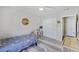 This bedroom features a ceiling fan and a window providing natural lighting at 1166 Turkey Trot Dr, Johns Island, SC 29455