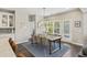 Inviting dining room with stylish chandelier, seating for eight, and natural light from the backyard at 1166 Turkey Trot Dr, Johns Island, SC 29455