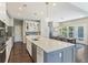 Spacious kitchen with a large island, stainless steel appliances, and an adjacent dining area at 1166 Turkey Trot Dr, Johns Island, SC 29455