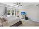 This main bedroom boasts an ensuite bathroom and an exterior window with natural lighting at 1166 Turkey Trot Dr, Johns Island, SC 29455