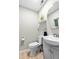 Bathroom featuring a modern toilet, sink, vanity, mirror and flooring at 120 Lisa Dr, Summerville, SC 29485