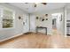 Light-filled entryway with wood-look floors and modern decor offers a welcoming feel at 120 Lisa Dr, Summerville, SC 29485