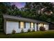 Charming white brick home features a well-maintained lawn and inviting curb appeal at 120 Lisa Dr, Summerville, SC 29485