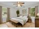 Cozy bedroom with ceiling fan, natural light, and a comfortable aesthetic at 120 Lisa Dr, Summerville, SC 29485
