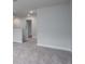 Neutral hallway with plush carpeting, recessed lighting, and white baseboards at 121 Royal Cainhoy Way, Huger, SC 29450